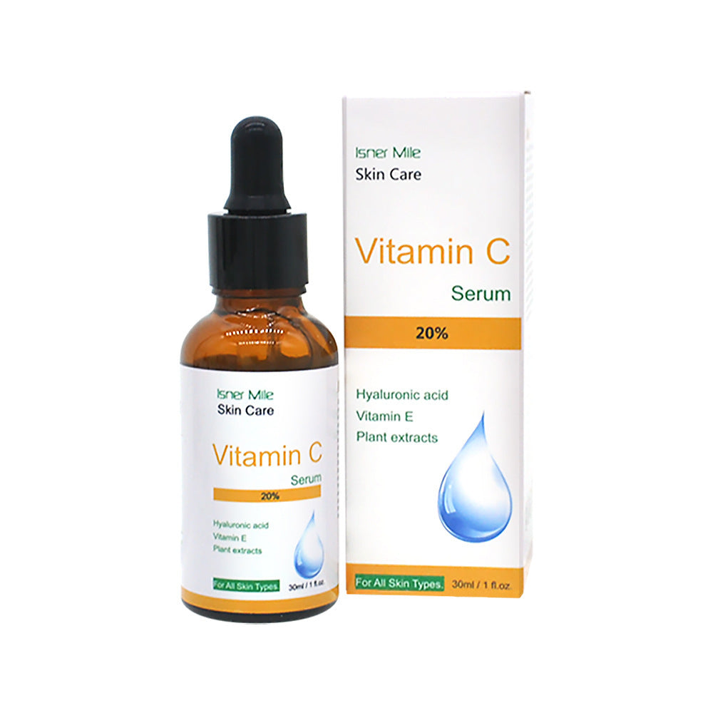 Vitamin C serum bottle and packaging on a white background