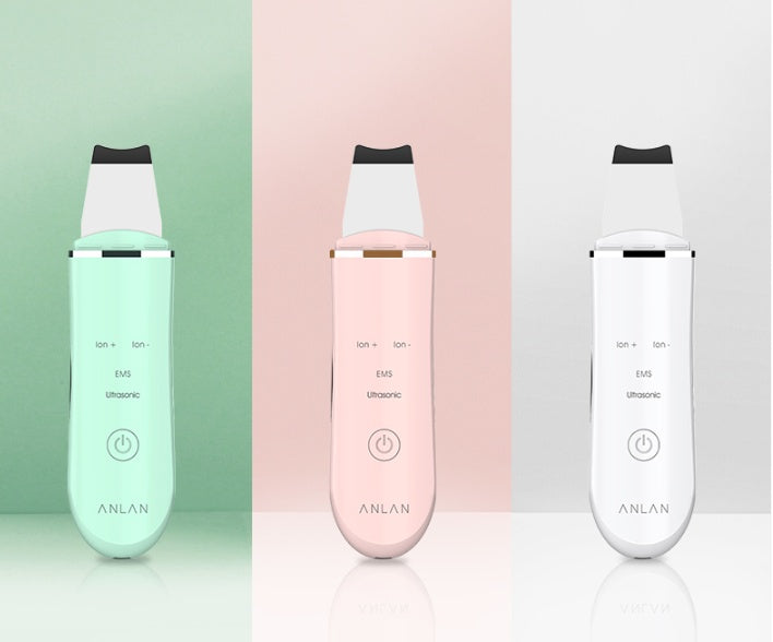 Three ANLAN skincare devices in green, pink, and white on a gradient background