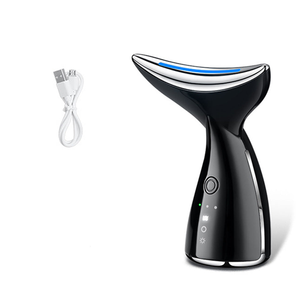 Black handheld device with USB cable and user manual on a white background