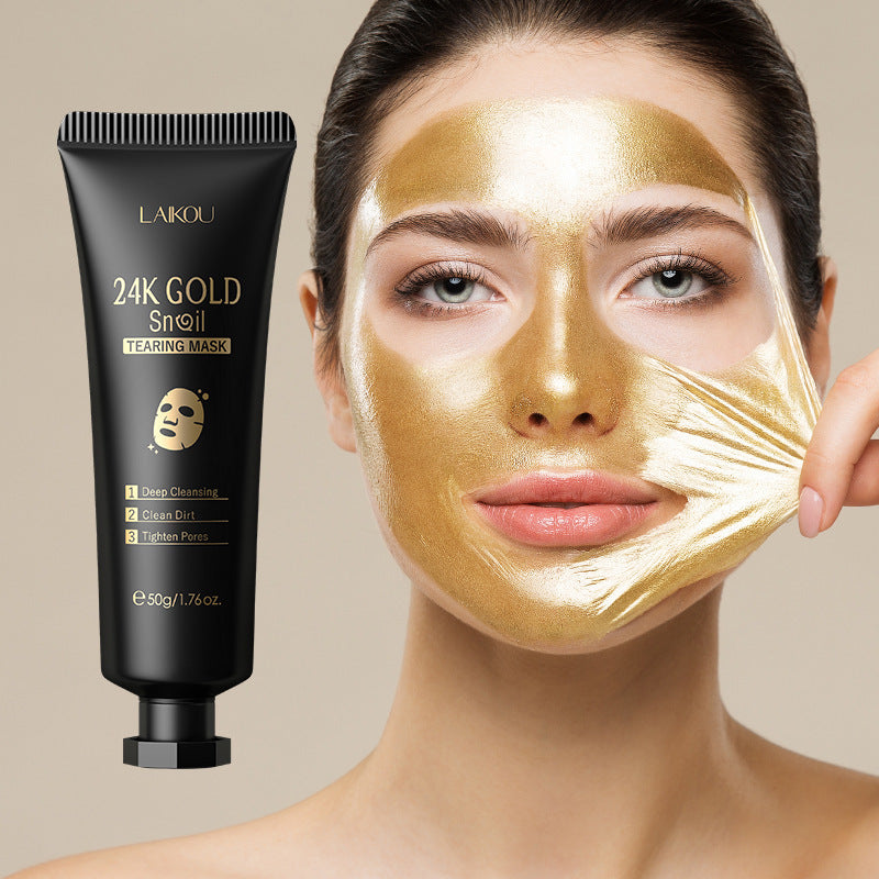 Woman wearing a gold face mask with a Lakou 24K Gold Snail Tearing Mask product on a beige background