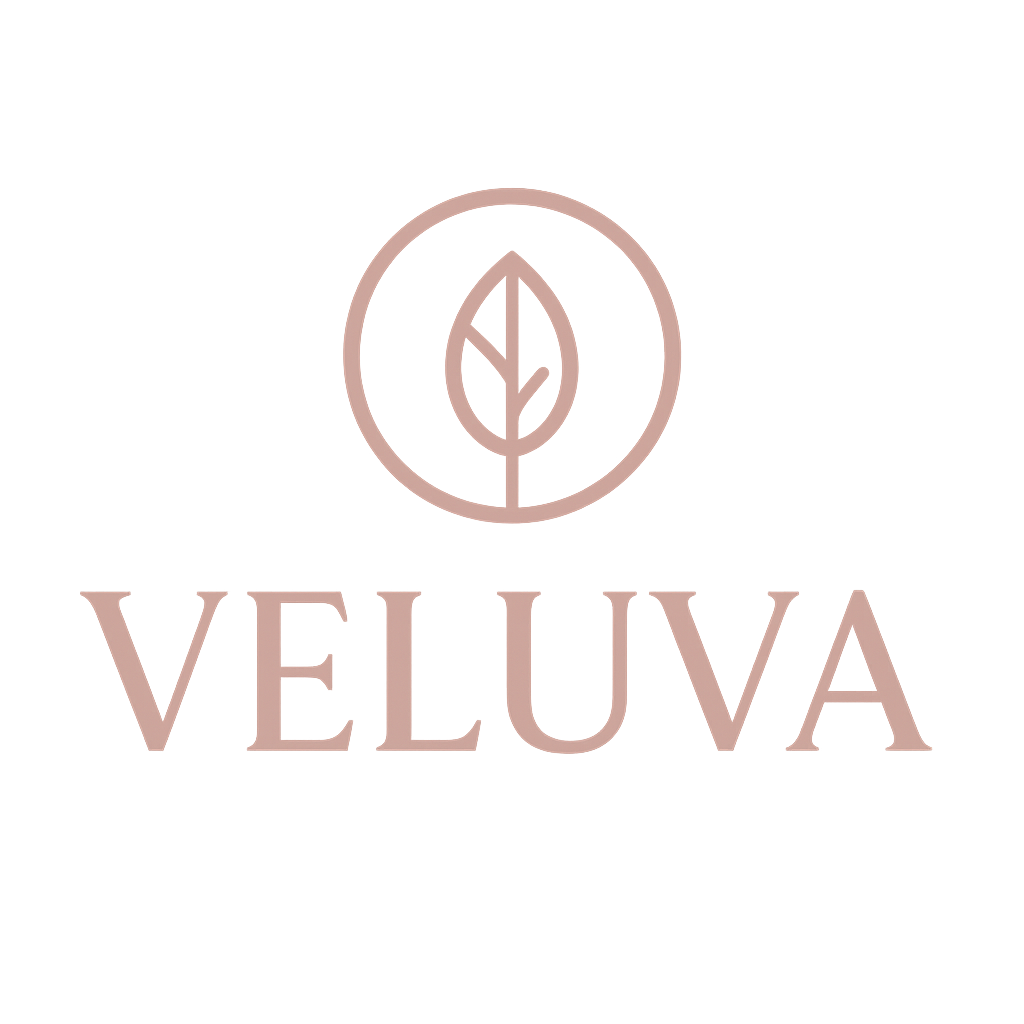 Veluva logo with a leaf design on a light pink background