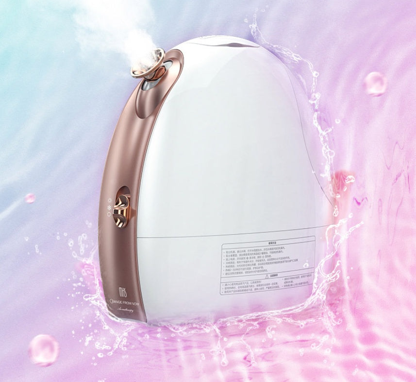 White and rose gold electronic device with water droplets and light effects on a gradient background