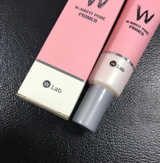 W.Lab W-Airfit Pore Primer bottle and box on a textured black surface