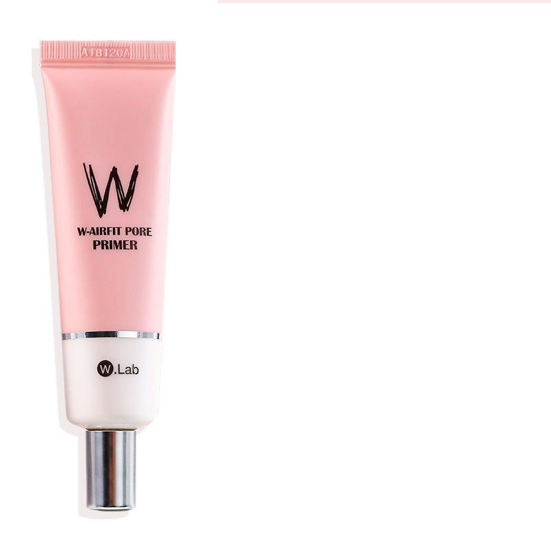 Pink W-Lab primer bottle on a white background